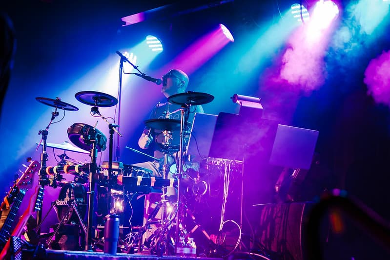 Band performing at a corporate event with elegant decor