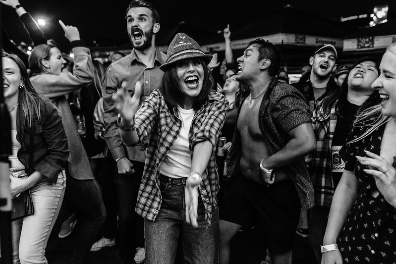 Guitarist stepping forward for a spotlight solo