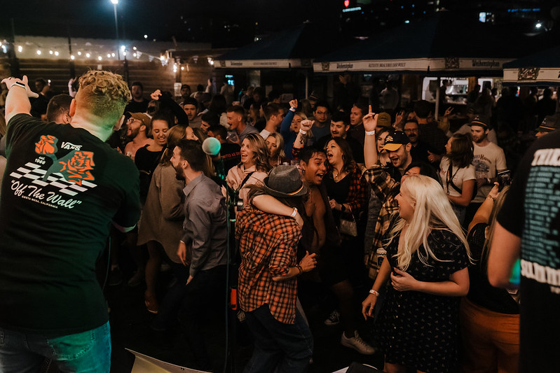 Energetic band performance with colorful light show