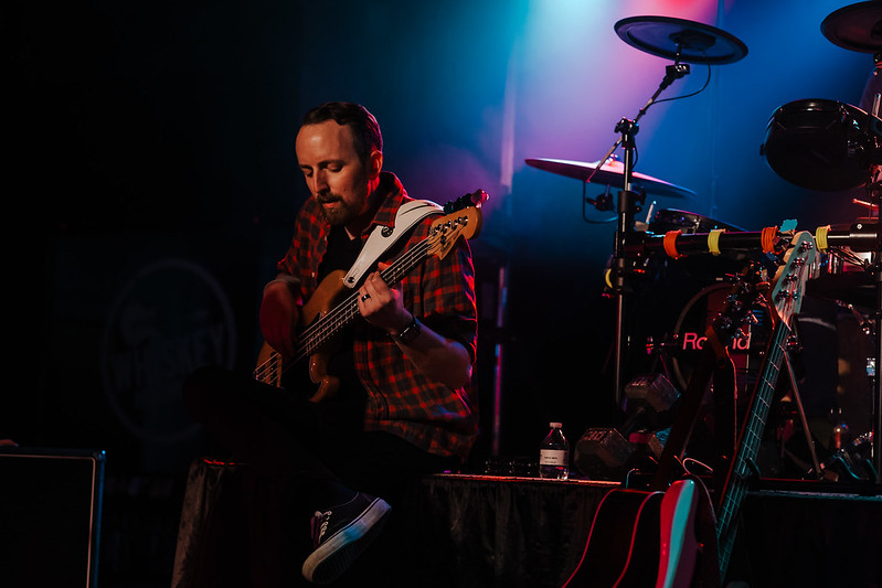 Rhythm section locked in during a funky groove